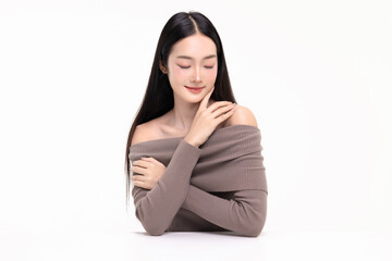 Beautiful young Asian woman with healthy and perfect skin on isolated white background. Facial and...
