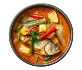 Delicious bowl of spicy thai fish soup with fresh vegetables and aromatics on a transparent background