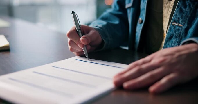 Hands, person and signature on contract for agreement, mortgage deal or title deed for compliance. Pen, paperwork and filling form for loan application, insurance policy or writing on legal document