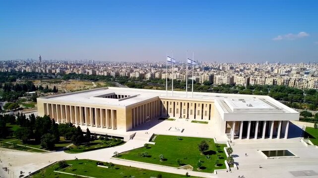 Aerial View: Israeli Parliament Building, Cityscape, Blue Sky, Flags.