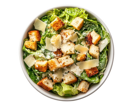 A delicious caesar salad with parmesan croutons and romaine lettuce in a white bowl transparent background