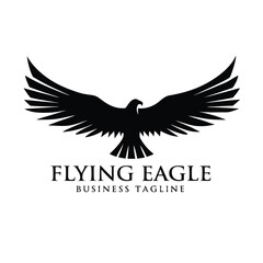 Obraz premium Black eagle soars with spread wings, an embodiment of freedom and strength