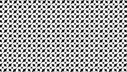 A black and white geometric pattern with repeating floral and diamond shaped elements throughout the image