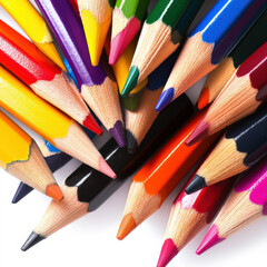 Scattered colorful pencils on white surface isolated