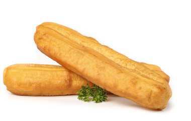 Crispy golden big fries on white background featuring traditional deep-fried breakfast treat