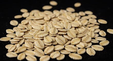 Healthy breakfast ingredient: a full frame of natural rolled oats, highlighting their individual texture.

