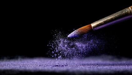 Close-up of a purple cosmetic brush impacting powder, creating a dynamic spray effect on a dark surface