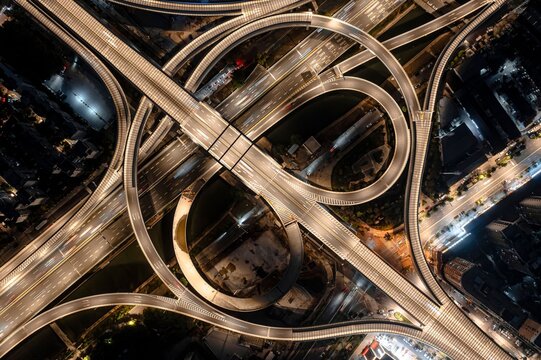 Aerial view of highway interchange at night