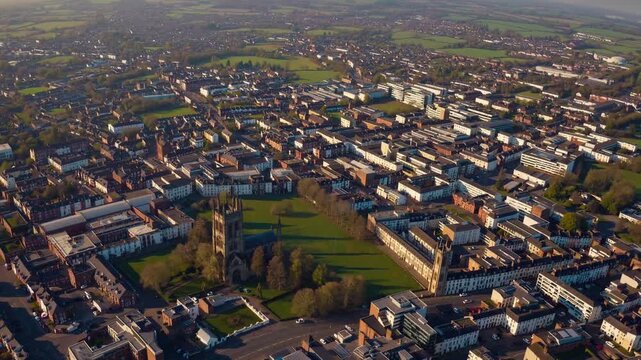Stunning Aerial View of Coventry Cityscape Panoramic Scene with Modern Buildings and Green Field, Ideal for Promotional Campaigns and Urban Themed Projects, Invokes a Sense of Peace and.