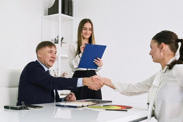 Business meeting highlights collaboration between professionals in a modern office setting