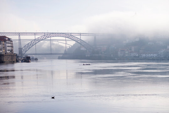 Misty morning over Douro River and Lu&iacute;s I Bridge
