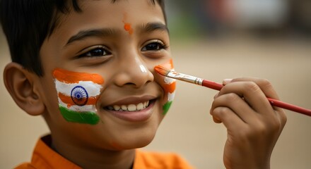 Young Indian boy with face painted in the colors of the Indian flag, celebrating Republic Day or Independence Day