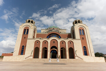 Stunning architectural design of a modern church in a serene location under a blue sky