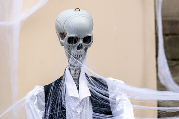 A Life Size Skeleton Ready for a Trick or Treat Night. Concept The centerpiece of a spooky decor.