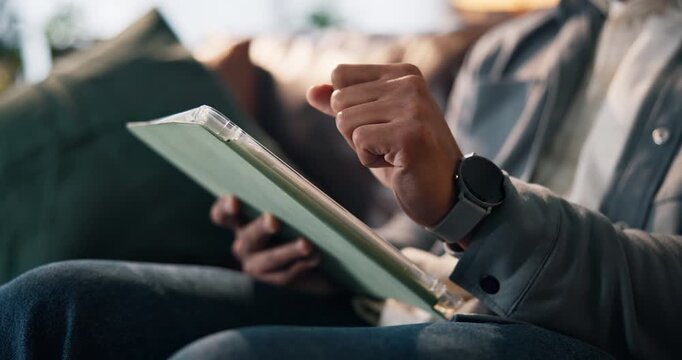 Man, hands or scroll with tablet on sofa for research, online connection or network in home. Closeup, male person or user with technology, UX or UI for software update, subscription or app in house