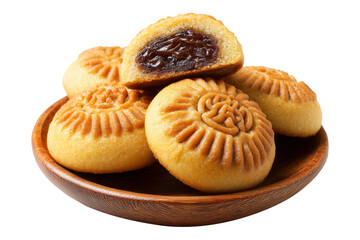 Traditional Maamoul cookies, one halved showing date and nut filling, isolated on white transparent background, concept of Arabic festive desserts