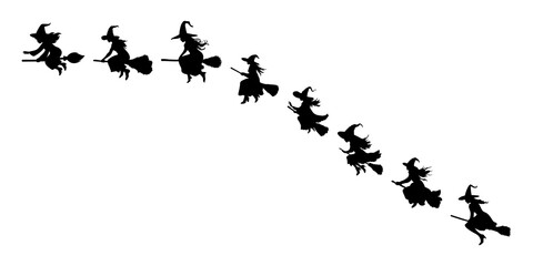 silhouette of a witch on a broomstick