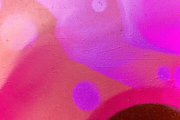 bright colorful pattern of beautiful street wall with art graffiti background. Vivid modern urban texture for wallpaper and design