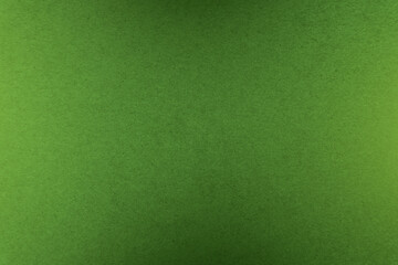 Craft paint solid green tone color paint on environmental friendly cardboard box blank paper texture background with space minimal style