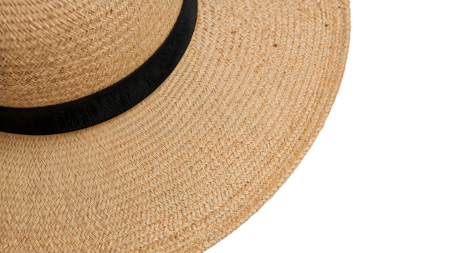 Closeup of straw sun hat with wide brim and black ribbon on the transparent background for summer fashion and accessories concepts