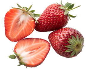 Fresh ripe strawberries one whole and two halved showing juicy red flesh and seeds isolated on black