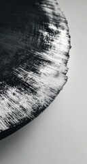 Abstract circular plate, dark gray/black with textured white edge