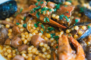 
Fregola with seafood, a typical Sardinian dish, in Italy.
Food, a traditional Mediterranean dish...
