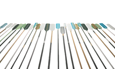 Colorful Oars on Green Background Rowing Kayaking Canoeing Equipment