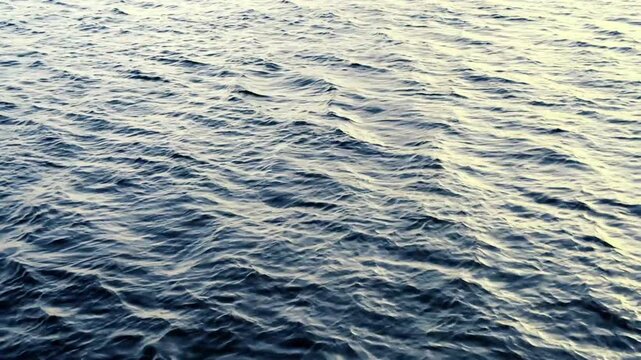 cinematic pro res video of gentle water waves moving in slow motion, luxury lifestyle and real estate background video