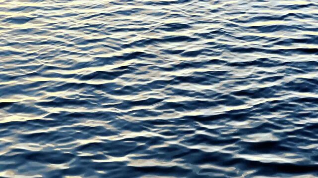 dancing blue water waves in the ocean, 4k pro res seamless water waves stock video