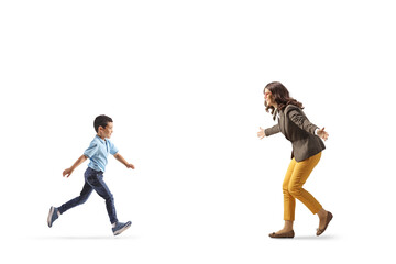 Kid running to hug a young woman