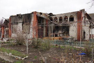 Mine hit. Destroyed house. Burned car. War in Europe. Military aggression.