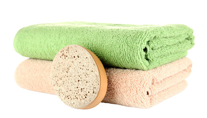 Stack of folded green and beige towels, a pumice stone isolated on solid background Png form