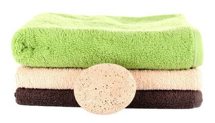 Stack of folded green and beige towels, a pumice stone isolated on solid background in |Png form