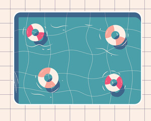 An inviting bird's-eye view captures a refreshing swimming pool, the turquoise water gently rippling with four vibrant life rings.