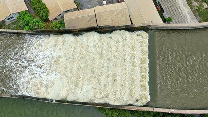 Aerial view of the Elevated Water Drainage Bridge, serving as the main channel to quickly push water from the area out to sea, effectively reducing and preventing flooding during high water levels.
