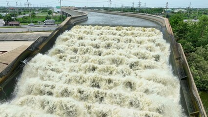 Bird's eye view showing the Elevated Water Drainage Bridge that efficiently drains water to the sea, helping prevent floods, especially during periods of heavy rainfall or high water levels.
