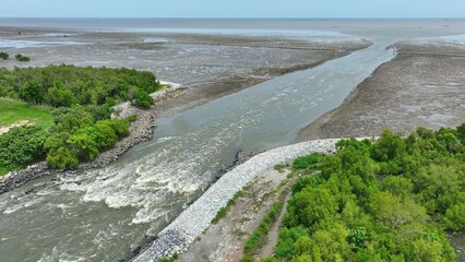Aerial drone view of the Water Transfer Bridge speeding water flow to the sea, preventing flooding with advanced engineering and technology for efficient water management and infrastructure.
