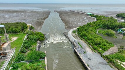 Aerial drone view of the Water Transfer Bridge accelerating water flow to the sea, playing a key role in flood prevention and effective flood management in vulnerable areas.
