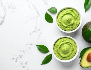 Obraz premium Overhead shot of avocado mousse in white bowl, wide composition with space for text. Fresh, creamy, and healthy, perfect for dessert, vegan, and food photography projects.