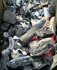 pile of charcoal is smoldering