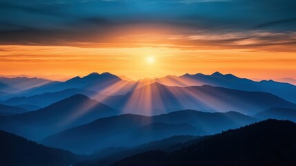 Majestic sunrise over layered mountain ranges