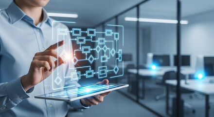 Professional businessman in modern office interacting with futuristic transparent financial data and graph interface