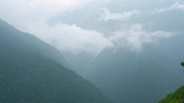 A panoramic shot of a valley in Manali during sunset, Himachal Pradesh, India.	