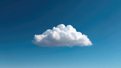 Single puffy white cumulus cloud against a vibrant blue sky