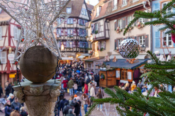 Christmas ornament and festive decorations at a busy holiday market
