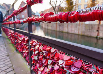 Love locks hanging on a bridge in colmar, france
