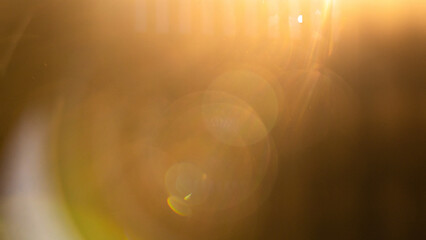 light sparkle flash spotlight backdrop with golden sunlight shine background.