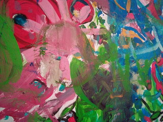 Smearing paint on the wall. Children learn to paint with oil paints. Background for design.