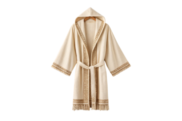 Cream colored hooded bathrobe with decorative brown trim, belt tie, fringe hem and traditional styling, isolated on a transparent background